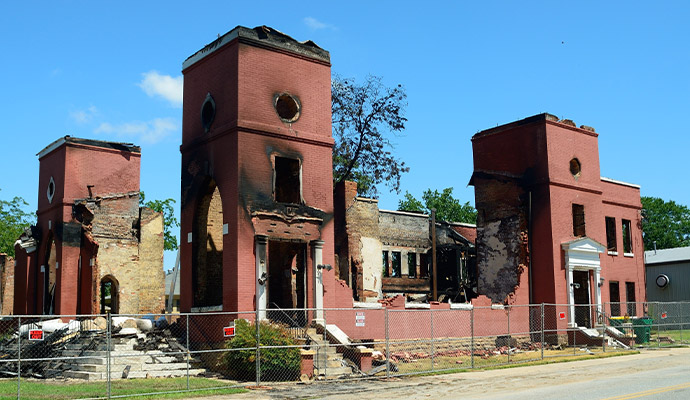 Fire damaged church building requiring structural restoration
