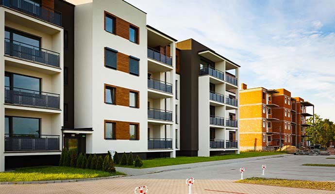 Modern balconied apartment buildings with wood accent exterior