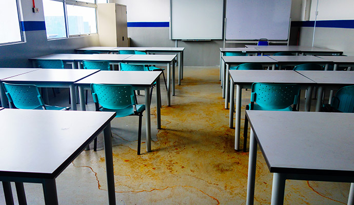 Water damage floor stains in the classroom