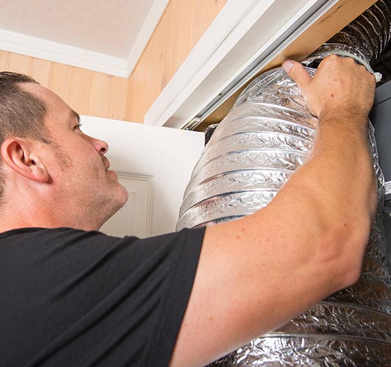 Professional worker repairing duct Professional worker repairing duct