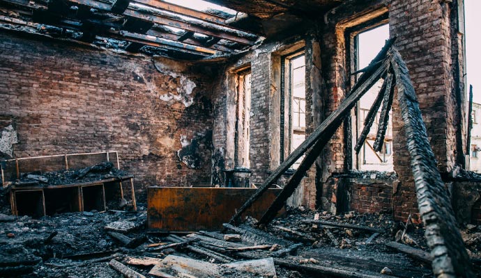 Fire damaged room Fire damaged room