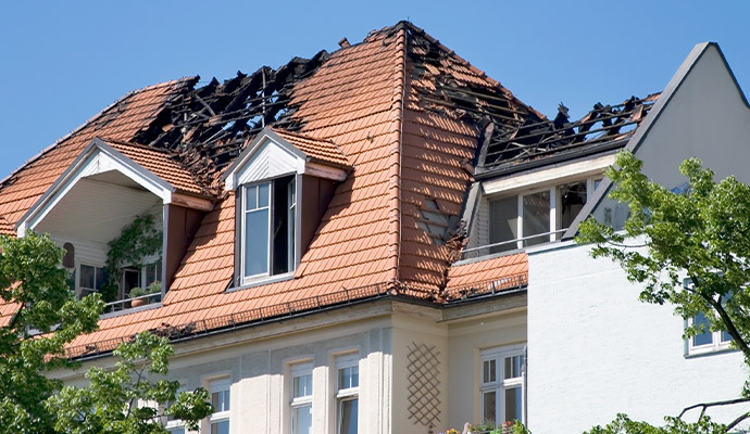 House with fire damaged roof