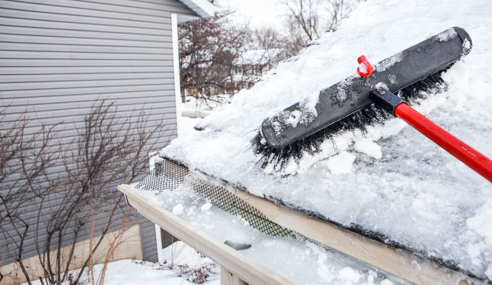 Clearing snow from roof