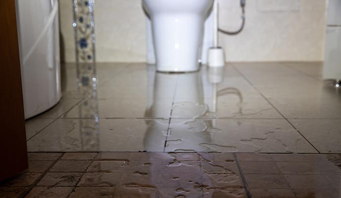 Water damage bathroom floor